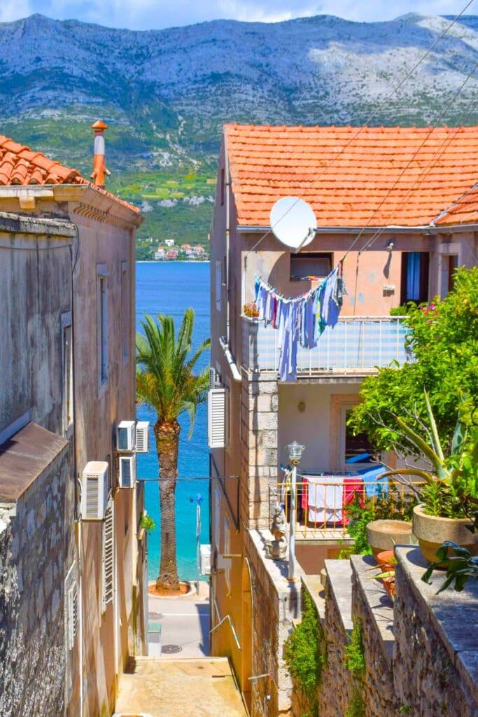 Old town streets leading to the sea on Korcula island Croatia
