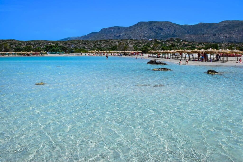 Knee-deep clear waters at Crete's Elafonissi Beach