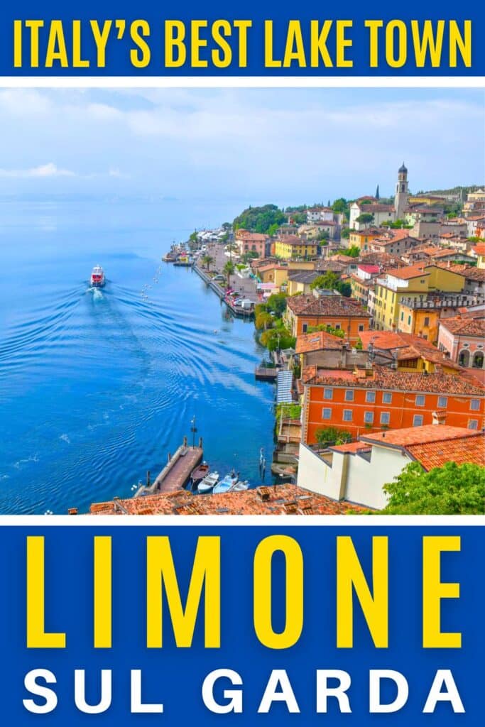 image of a small boat sailing away from the harbor of Limone sul Garda with red and yellow colorful waterfront homes