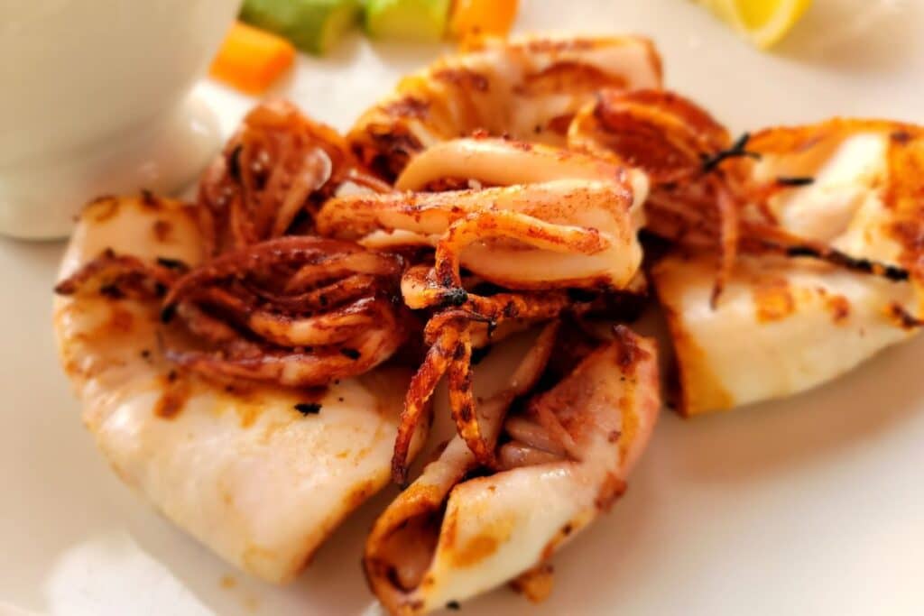 Fresh grilled calamari Paros Greece